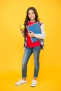 Eat good food to be cute. Happy girl hold apple and books. Brain food. School snack. Healthy eating habits. Natural food Royalty Free Stock Photo
