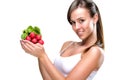 Eat healthily - Beautiful woman holding a bunch of radishes Royalty Free Stock Photo