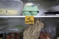 Eat healthy written on a post it note stuck on a fridge shelf Royalty Free Stock Photo