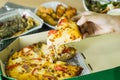 Eat at home by ordering through the delivery service,Selective focus Delicious pizza,Spaghetti BBQ Chicken Wings and a salad next Royalty Free Stock Photo