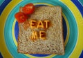 Eat me words on toast Royalty Free Stock Photo