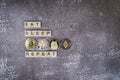 Eat sleep crypto repeat text with Bitcoin, XRP, Dogecoin and Ethereum coins on grey background