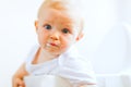 Eat smeared pretty baby impressively looking Royalty Free Stock Photo