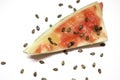 Eaten slice of watermelon with watermelon seeds isolated on white background Royalty Free Stock Photo