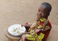 Eating in Africa - Little Black Boy Hunger Symbol Royalty Free Stock Photo