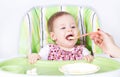 Eating baby girl Royalty Free Stock Photo