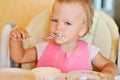 Eating baby girl Royalty Free Stock Photo