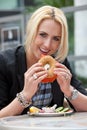 Eating a bagel Royalty Free Stock Photo