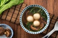 Eating big tangyuan yuanxiao with savory soup in Taiwan