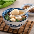 Eating big tangyuan yuanxiao with savory soup in Taiwan