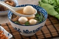 Eating big tangyuan yuanxiao with savory soup in Taiwan