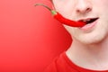 Eating chili pepper Royalty Free Stock Photo