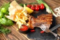 Eating of delicious grilled ribs