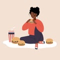 Eating disorder. Depressed african woman eating fast food. Concept of extreme overeating. Bad habits. Food addiction Royalty Free Stock Photo