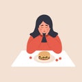 Eating disorder. Sad arabian woman looks at hamburger and worries about being overweight. Overeating, bulimia, anorexia