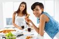 Eating Fast Food. Friends Eating Pizza. Home Party. Leisure, Celebration. Royalty Free Stock Photo