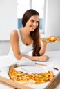 Eating Fast Food. Woman Eating Italian Pizza. Nutrition. Diet, L Royalty Free Stock Photo