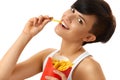 Eating Food. Woman Holding French Fries. White Background. Fast Royalty Free Stock Photo