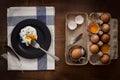 Eating fried eggs flat lay still life rustic with food stylish Royalty Free Stock Photo