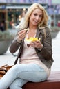 Eating fries Royalty Free Stock Photo