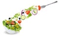 Eating green salad in bowl with fork, tomatoes, onion, olives an Royalty Free Stock Photo