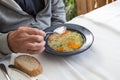 Eating home cooked soup witt carrots, noodels  and parsley Royalty Free Stock Photo