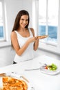 Eating Italian Food. Woman Eating Pizza. Fast Food Nutrition. Li