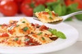 Eating Italian Pasta Ravioli with tomato sauce noodles meal Royalty Free Stock Photo