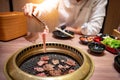 Eating Korean Barbecue buffet in restaurant Royalty Free Stock Photo