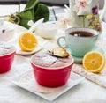 Eating lemon pudding with red plates, English Tea Party Royalty Free Stock Photo