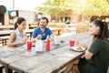 Eating oriental food and having a good time Royalty Free Stock Photo