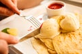 Eating pancake with ice cream and strawberry sauce Royalty Free Stock Photo