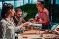 Eating pizza with diverse colleagues in the office, happy multi-ethnic employees having fun together during lunch Royalty Free Stock Photo