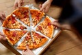 Eating Pizza. Group Of Friends Sharing Pizza. Fast Food, Leisure Royalty Free Stock Photo