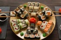 Eating set of sushi maki and rolls in japanese resaturant Royalty Free Stock Photo