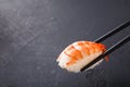 Eating sushi at restaurant, japanese cuisine Royalty Free Stock Photo