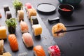 Eating sushi at restaurant, japanese cuisine Royalty Free Stock Photo