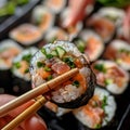 Eating Sushi Rolls with Chopsticks in Hands, Taking Sushi Roll, Eating Susi in Japanese Restaurant