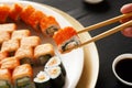 Eating sushi rolls at japanese food restaurant Royalty Free Stock Photo