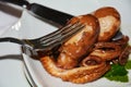 Eating tasteful octopus. Fresh fish, close up Royalty Free Stock Photo