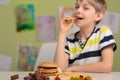 Eating unhealthy snacks for lunch Royalty Free Stock Photo