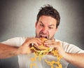 Eating with violent impetuosity Royalty Free Stock Photo