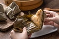 Eating zongzi rice dumpling for Dragon Boat Festival celebration