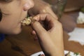 eats vegetable salad with a fork, mouth open Royalty Free Stock Photo