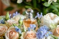 The eau de parfum production thrives in an aromatic scent garden, where white glass and liquid essence mingle to create a delightf