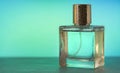 Eau de Toilette . Perfume on a pale green background. Royalty Free Stock Photo
