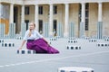 Eautiful young woman in Palais Royal in Paris Royalty Free Stock Photo