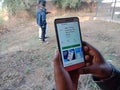 ebay online shopping app displayed on smart phone screen at agriculture field in india dec 2019