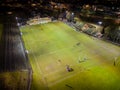 EBBW VALE, WALES - FEBRUARY 03 2023: Night time aerial view of the floodlit main Rugby union ground in the Welsh valleys town of