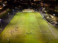 EBBW VALE, WALES - FEBRUARY 03 2023: Night time aerial view of the floodlit main Rugby union ground in the Welsh valleys town of